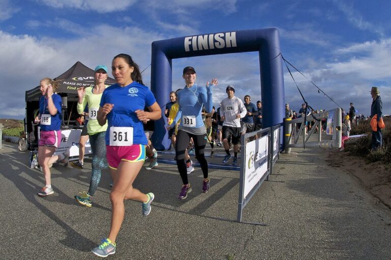 Runners crossing the finish line of a race
