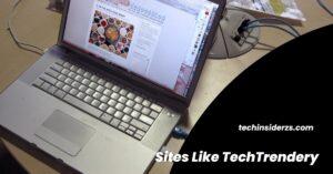 Laptop on a desk showing a news website