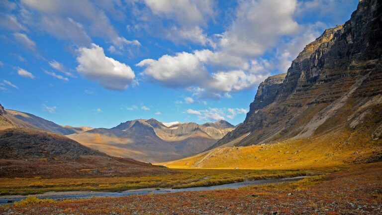 Mountain valley under a bright blue sky
